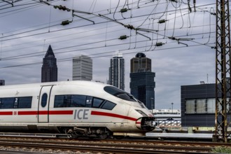 ICE train on the track in front of the main station of Frankfurt am Main, Skyline, Hesse, Germany,