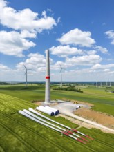 Wind farm near Brilon-Radlinghausen, new wind turbine being built, tower elements and rotors ready