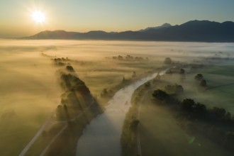 Aerial view of a river in front of mountains in the morning light, fog, autumn, Loisach, view of