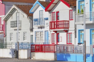 Brightly painted beach homes, Costa Nova do Prado, Aveiro, Portugal, Europe