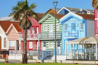 Brightly painted beach homes, Costa Nova do Prado, Aveiro, Portugal, Europe