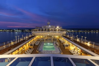 Cruise ship at sunset on vacation around Caribbean islands and Panama Canal in Central America