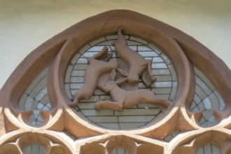 Three-hare window in the inner courtyard of Paderborn Cathedral, Paderborn, North Rhine-Westphalia,