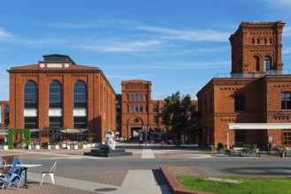 Historic brick building on a sunny summer day, impressive architecture, Manufaktura, Lódz, Lodz,