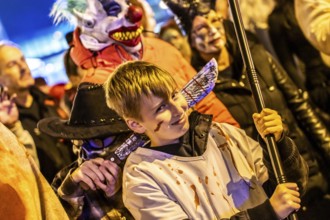 The Zombiewalk in Essen, on Halloween several hundred people, some dressed as scary zombies,