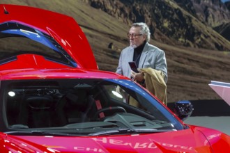 Detroit, Michigan USA - 10 January 2025 - A visitor examines a 2025 Chevrolet Corvette Stingray at