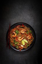 Fried udon noodles with shrimp and vegetables, Asian cuisine, homemade, no people