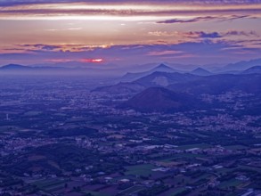 View of the densely populated Neapolitan region and the mountains near Caserta at dusk. San Felice