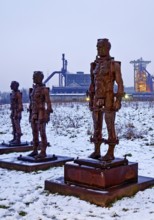 People made of iron, multi-part iron sculpture by Zbigniew Fraczkiewicz in front of the