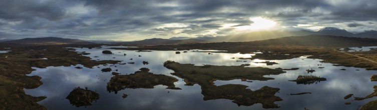 Morning light, cloudy mood, sunbeams, loch, mountain landscape, moor, aerial view, panorama, road,