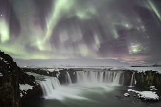 Northern Lights or Aurora Borealis, river Skjálfandafljót, waterfall Góðafoss or Godafoss, long