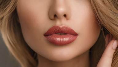 Close-up of full lips with red lipstick and blonde highlights, AI generated, AI generated