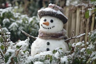 Snowman with carrot nose and knitted hat in garden covered in snow in winter. Generative Ai, AI