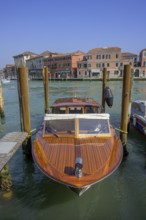 Wooden boat on the Grand Canal, Murano, Venice, Metropolitan City of Venice, Italy, Europe