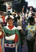 Carnival procession celebrations colourful costumes, Port of Spain, Trinidad, 1963 - captioned as