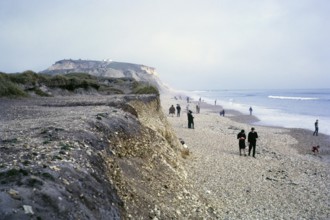 People on the beach at Hengistbury Head, Dorset, England, in 1966