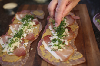 Swabian cuisine, preparation of beef roulade with pine nuts, meat dish, raw beef with Black Forest