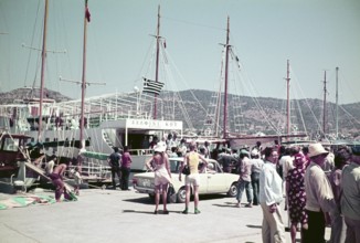 Harbour with people and boats, ferry on board, Kos, Greece 1970s