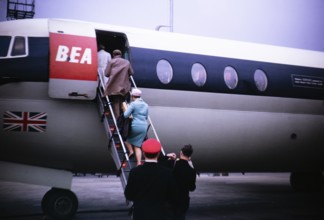 Passengers boarding a BEA aircraft via a staircase, 1966