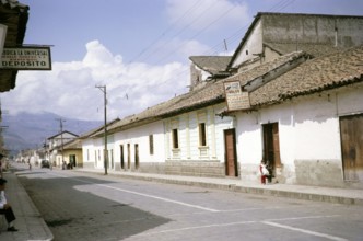 Census day, Riobamba, Chimborazo province, Ecuador, South America, 1962 quiet street and people at