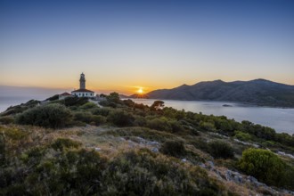 Lighthouse on a hill with sunset over the sea, Lastovo, Neretva, Croatia, Europe