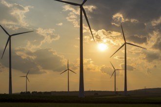 Wind farm, wind turbine, wind turbines, in front of sunset, storm clouds, Swabian Alb,