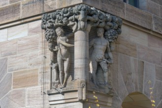 Scene of Adam and Eve in Paradise, stone sculptures on the courthouse, built between 1909 and 1916