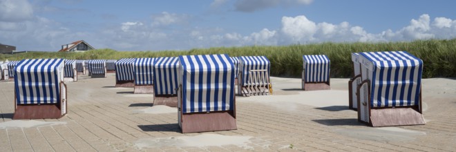 Beach chairs on the promenade, Norderney, East Frisian Island, East Frisia, Lower Saxony, Germany,