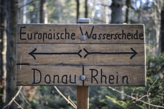 Sign and geological marker with the inscription European watershed, Danube and Rhine on the 980