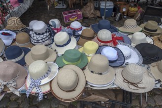 Market stall with straw hats for ladies, at the weekly market market, market square, Wismar,