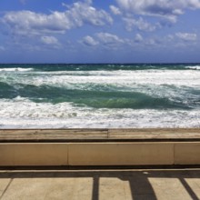 Empty bench with view of the surf, Las Negras, Cabo-de-Gata-Nijar, Cabo de Gata, Almeria,