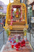 Small Buddhist temple with offering, religion, Buddhism, worship, God, Buddha, Asian, history,