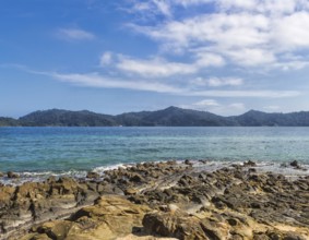 Rocky beach on a tropical island in marine park.Malaysia