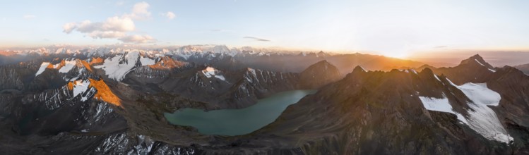 Evening mood, mountain panorama, aerial view, 4000 metre peak with glacier, mountain pass and