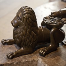 Bronze lion figure at the foot of the seven-armed candelabrum, Braunschweig Cathedral, Cathedral