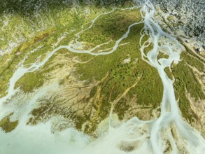 Glacial lake Lac de Chateaupre, lake just below the Moiry glacier, river arms in blue water, aerial