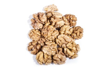 Pile of walnuts isolated on white background. Top view