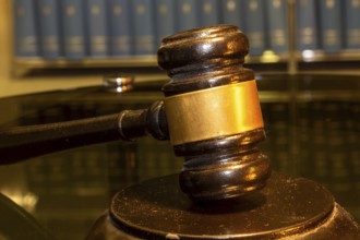 Close-up of a judge's gavel as a symbolic image for a court judgement