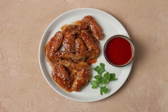 Chicken wings, with barbecue sauce, with tomato sauce, fast food, no people