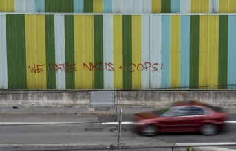 Motorway A40, Ruhrschnellweg, in the through road in Essen, noise barrier, with the slogan, we hate