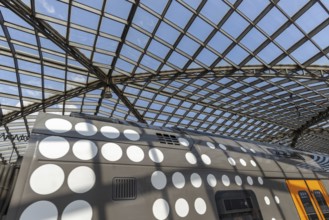 Local train and glass roof at Cologne Central Station, Cologne, Rhineland, North Rhine-Westphalia,