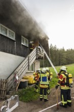 Fire brigade operation at a house fire, St Peter, Southern Black Forest, Black Forest,