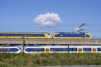 Trains of the Dutch railway, NS, Nederlandse Spoorwegen N.V., on a double-decker track, below local