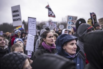 150, 000 people gather around the Bundestag in Berlin to build a human wall against the shift to