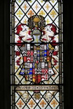 Heraldic stained glass window Church of Saint Mary, Coddenham, Suffolk, England, UK