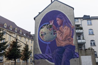 Mural, Girl with globe and compass, after a Gerhard Mercator portrait, mural by the artist duo