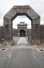 Entrance arches and doorway to Dartmoor prison, Princetown, Devon, England, UK