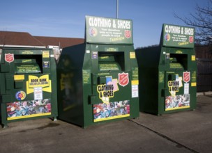 Clothing and Shoe recycling collection containers at a Tesco store, UK