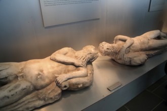 Reclining Sileni figure sculptures in museum, Baelo Claudia Roman site, Cadiz Province, Spain,