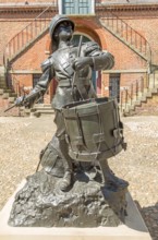 'The Drums of Fore and Aft' drummer boy sculpture by Arnold, Earl of Albemarle, Shire Hall, Market